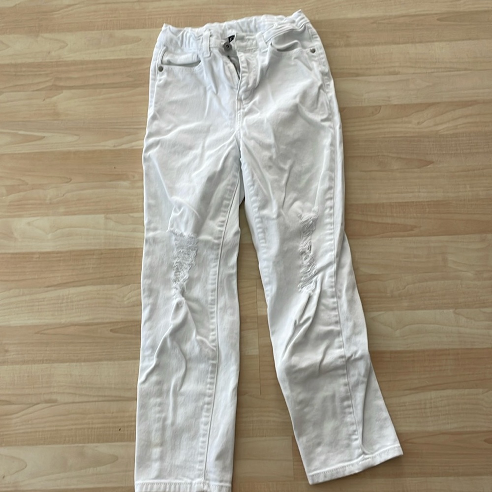 Distressed white jeans
